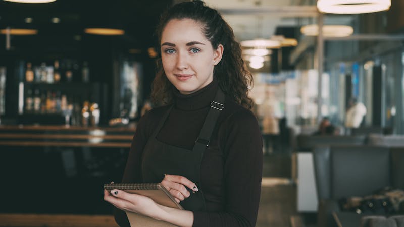 Friendly service staff ready to welcome guests at Jet's pizza